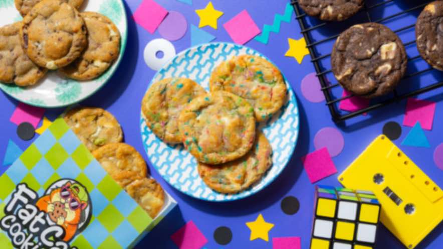 Assorted Fat Cat cookies in a colourful retro setting